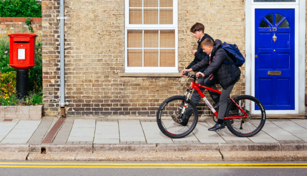 two teenage boys in Torfaen in school uniform managing the transition back to school